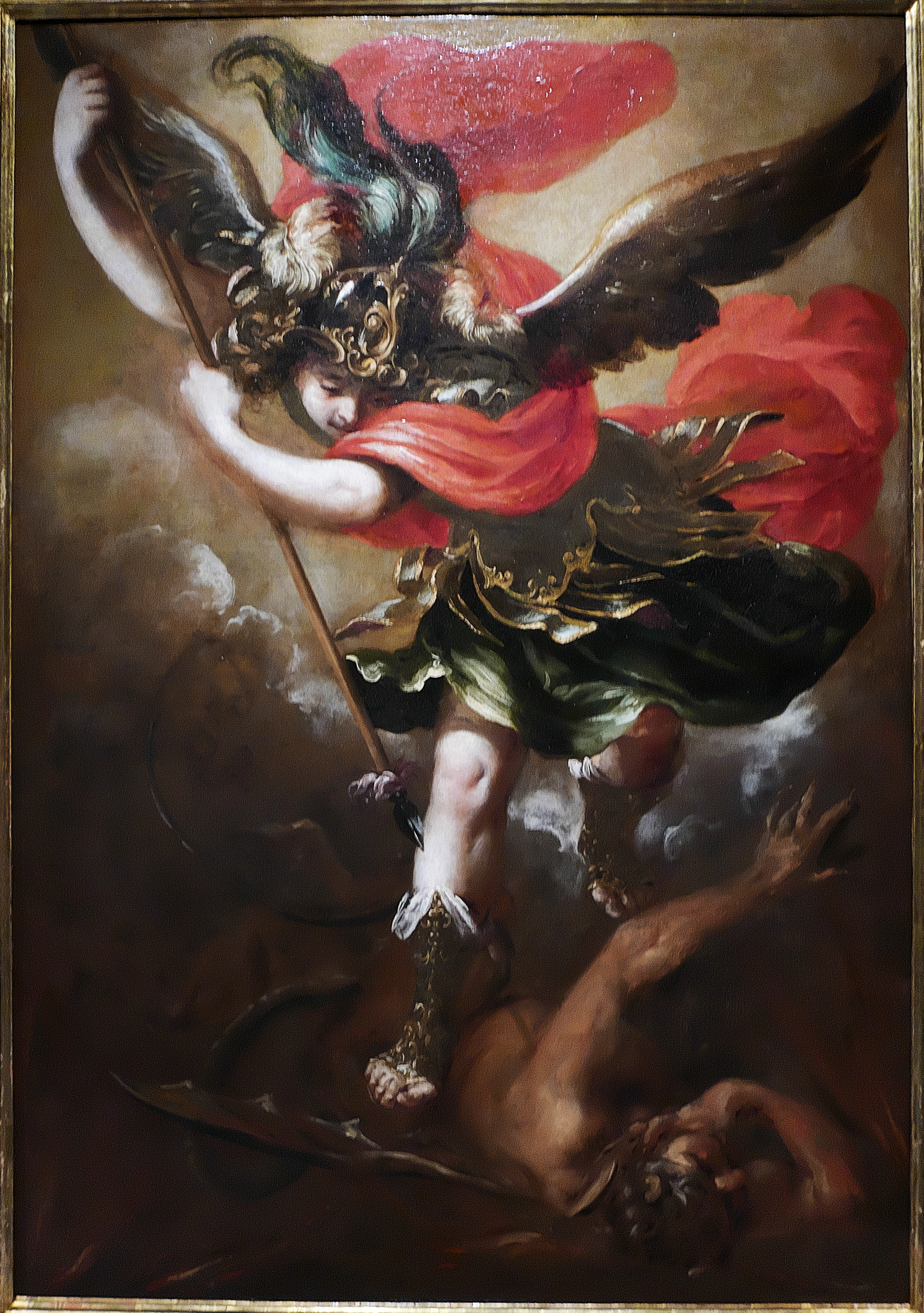 Saint Michael the Archangel, dressed in Roman attire, attacks Lucifer